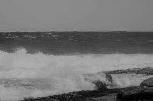 Dynamic Sea Waves Monochrome Coastal Beaut black and white image photo
