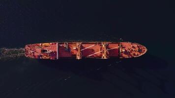 Drone view top down of the ship in motion with red deck video