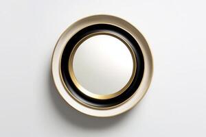 Circle mirror with beige, brown and gold frame on white background. photo