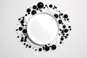 Spot of black and white blots of paint in the shape of a circle on a white background photo