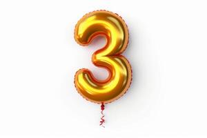 Bright party decoration balloon. Glossy gold number isolated on white background. Number 3. photo