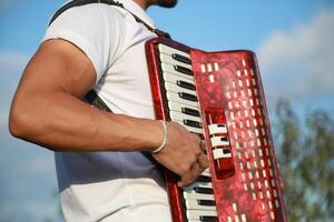 Hands On The Keyboard Of The Accordion photo