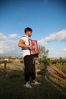 Dynamic Accordionist in Nature Embrace photo