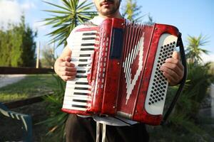 Hands On The Keyboard Of The Accordion photo