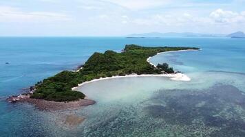 Drone shot of the beautiful Koh Madsum, with its crystal clear waters and beautiful coral reefs, in southern Thailand. video