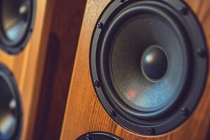 Powerful loudspeaker cone vibrating with sound waves photo