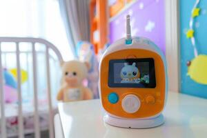 Modern baby monitor displaying image on lcd screen in bedroom photo