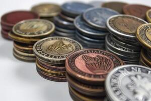 Stacks of commemorative challenge coins creating a colorful pattern photo