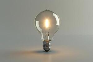 Bright lightbulb shining on a gray background symbolizing ideas and innovation photo