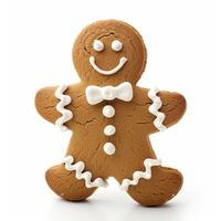 Gingerbread man smiling with icing decoration on white background photo