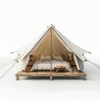 Large canvas tent with double bed on wooden platform standing on white background photo