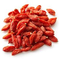 Goji berries forming a mound, isolated on white background photo