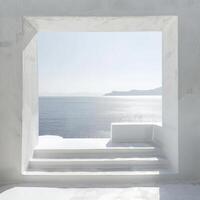 Square window framing view of calm sea and island from white building photo
