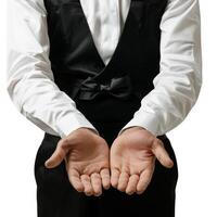 Waiter showing something with open palms wearing uniform photo