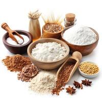 Different types of gluten free flour are laying on white background with spices and grains photo