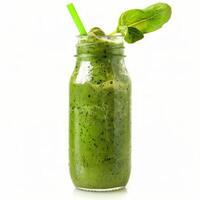 Green smoothie with spinach leaf in a bottle with straw photo