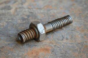 Rusty bolt and nut showing corrosion on metal surface photo
