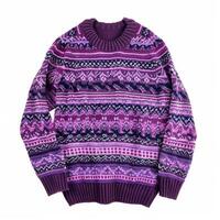 Folded purple winter sweater with geometric pattern on white background photo