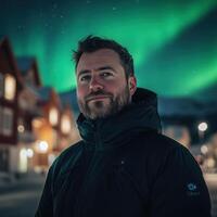 Man in a Winter Jacket Under a Majestic Aurora Borealis photo