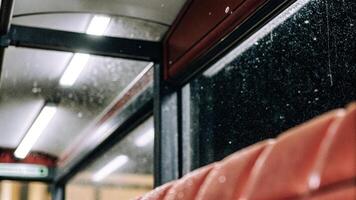 Macro shot of dust particles on a city bus stop, with a shallow depth of field photo