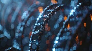 Abstract close-up of glowing beads intertwined with soft blue and orange lights, creating a mesmerizing visual photo