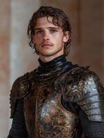 Portrait of a young man in medieval armor. photo