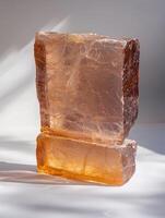 Raw orange quartz crystal specimen on white background photo