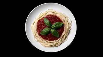 An overhead view of a plate of spaghetti with tomato sauce and basil. photo