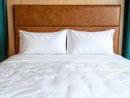 Luxurious hotel room with a comfortable bed and pillows photo