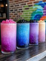 Rainbow bubble tea in a row photo