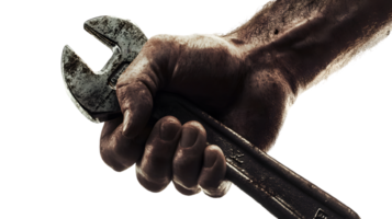 Close Up Of A Weathered Wrench Firmly Held In A Grimy Hand png