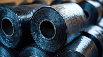 Close-up of rolls of waterproofing material, ready for use in construction photo