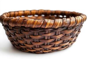 Empty wicker basket isolated on white background representin.g simplicity and craftsmanship photo