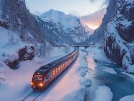 High-speed train running through snowy mountain photo