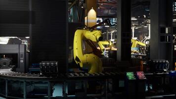 Robotic arm positioning items on a conveyor belt in a modern factory setting video