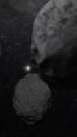 3d asteroides en espacio vertical video