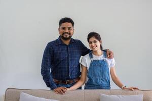 Happy Couple Embracing New Beginnings in Their Modern Home with Joyful Smiles and Excitement for the Future photo