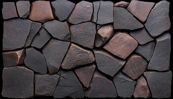 Dark, irregular stones are arranged seamlessly, showcasing a unique and rugged texture photo