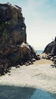 coastal view of a sand beach with cliffs video