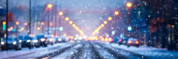 Winter street scene with falling snow and glowing streetlights photo