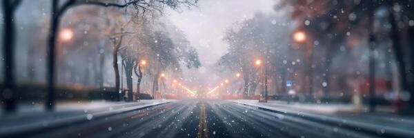 Winter street scene with snow, trees, and glowing streetlights photo
