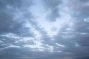 Gray sky background with gray clouds photo