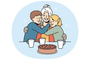 Happy family of grandmother and two grandchildren hugging sitting at table with hot cake and tea vector