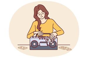 Woman inserts tape cassette into player to turn on music and start party in retro style vector