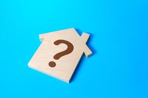 House with a question mark. Solving housing problems, deciding buy or rent real estate. Cost estimate. Search for options, choice type of residential buildings. Property price valuation evaluation photo