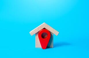 House and red location pin icon. Concept of finding a home to buy or rent. House moving company. Search for housing options. Tracking and navigation. Purchase. Realtor services. Delivery place. photo