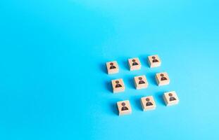 Ordered array of blocks with people. Concept of order, orderliness and uniform structure. Team building. Management strategies. Employee network. Human resource management, hiring and staffing. photo