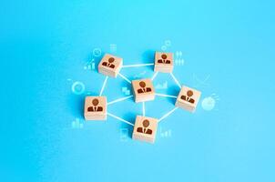 Connected group of people. Work a self-governing team without a leader. Communication and interaction between, exchange of information, skills and mutual assistance. Highly efficient organization. photo