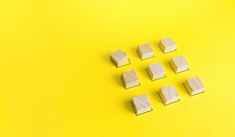 The blocks are in the correct order except for one. Violation of order, malfunction failure. Deviation from the norm. Determination and correction of the error. Disorder process. Discipline staggered photo