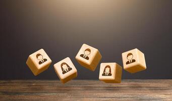 Levitating blocks with employees on a dark background. Human resources. Team creation for a new project. Leadership. Hiring and recruiting staff workers. Formation of effective working group. photo